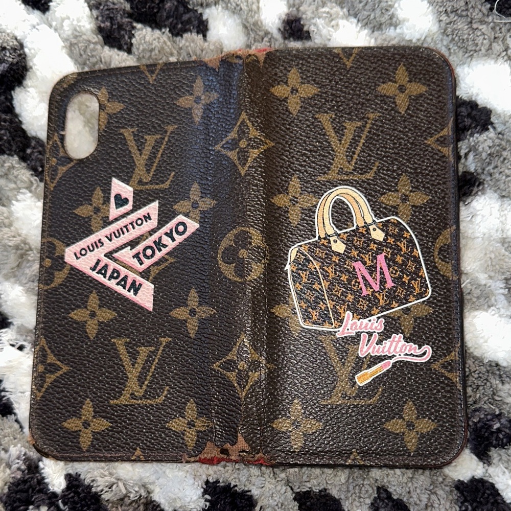 Louis Vuitton Brown Monogram Phone wallet Case with graphic designs damaged